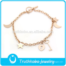 TKB-JB0015 Fashionable pure rose gold 316L stainless steel bracelets & bangles with casting hollow keys,moon,handbag and stars